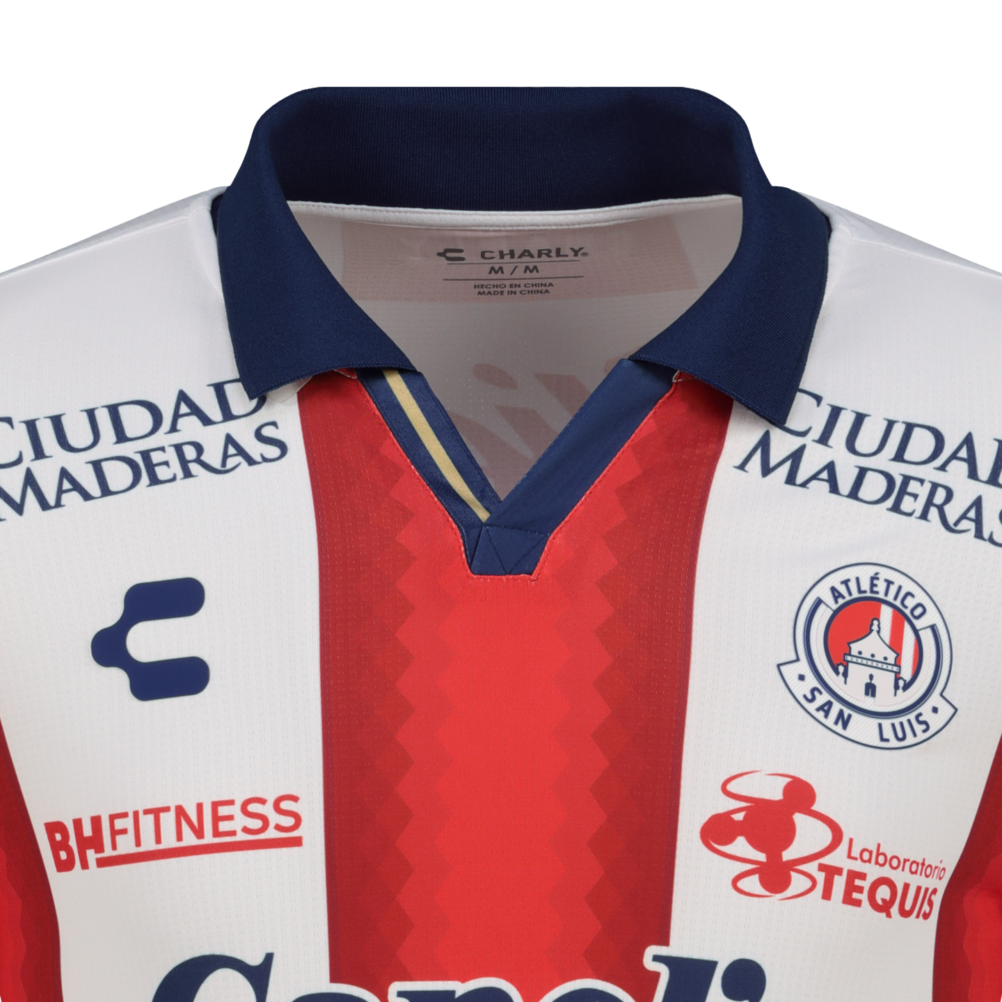 Close-up of an Atlético San Luis soccer jersey with red and white vertical stripes, a navy collar, and logos for Charly and several sponsors.