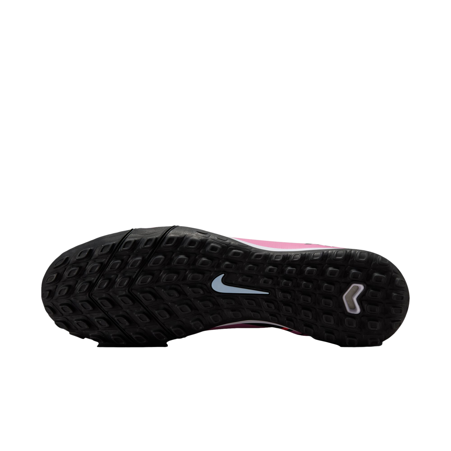 The black, multi-studded sole of a pink Nike soccer shoe features a light blue swoosh in the center and a white chevron logo on the heel.