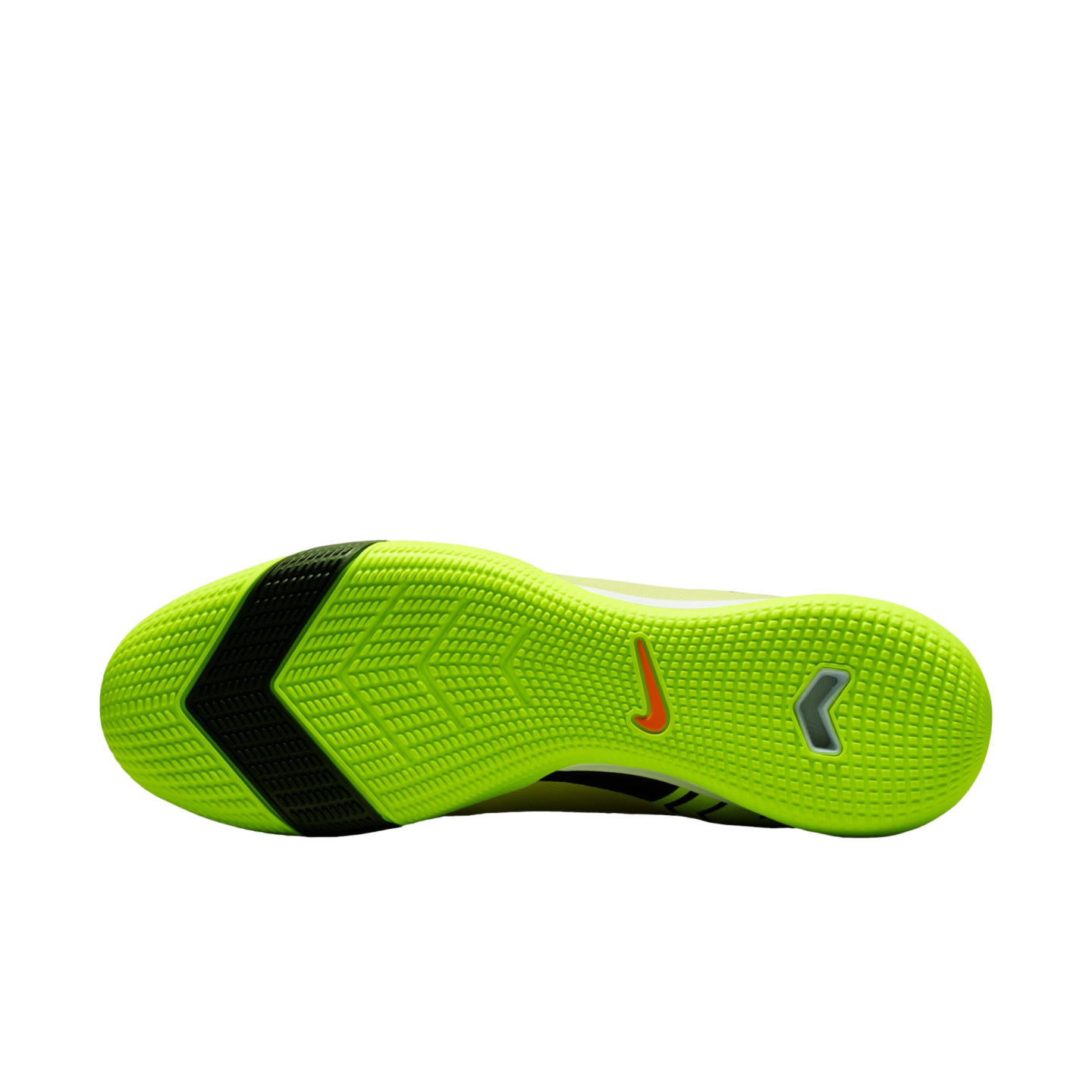 Sole of a neon yellow Nike indoor soccer shoe with a black diagonal stripe and textured grip pattern, set against a black background.