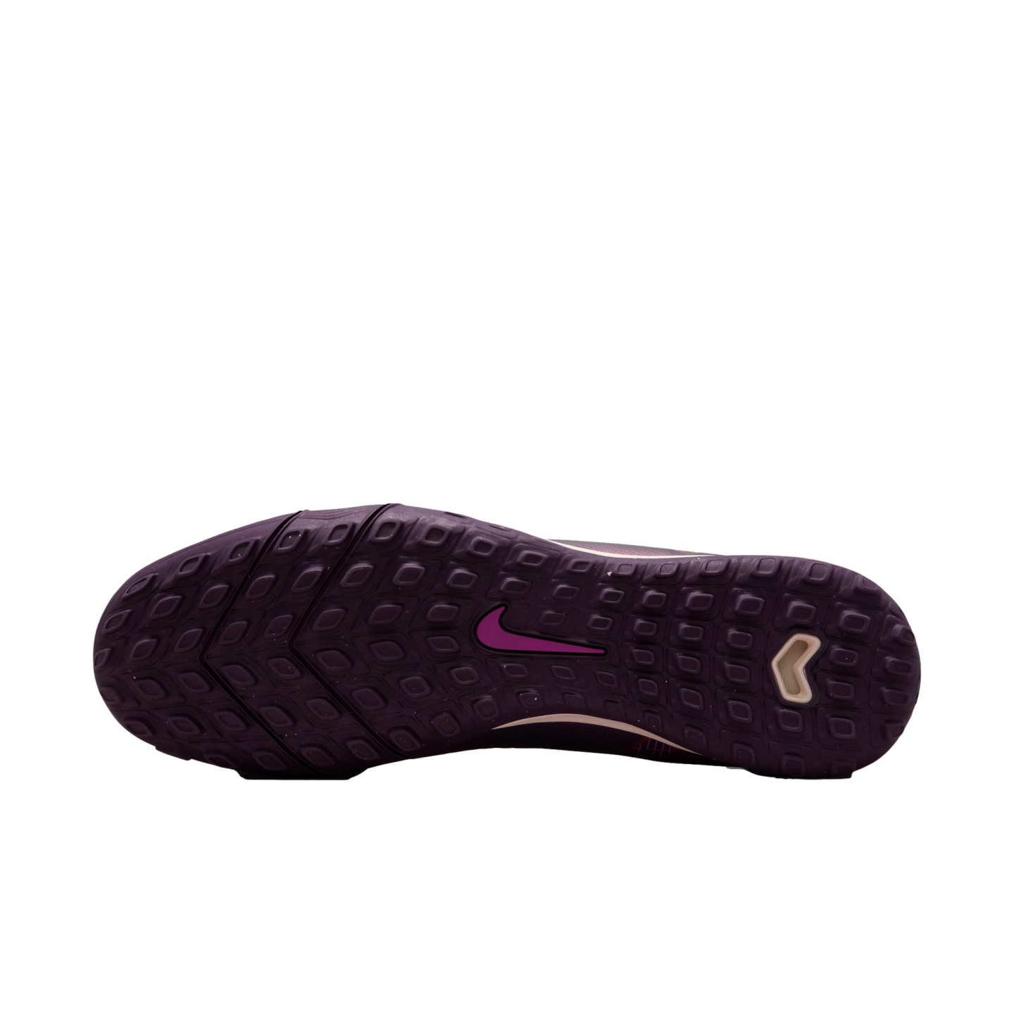 Dark purple Nike turf soccer shoe outsole with rectangular traction studs and a pink swoosh logo.