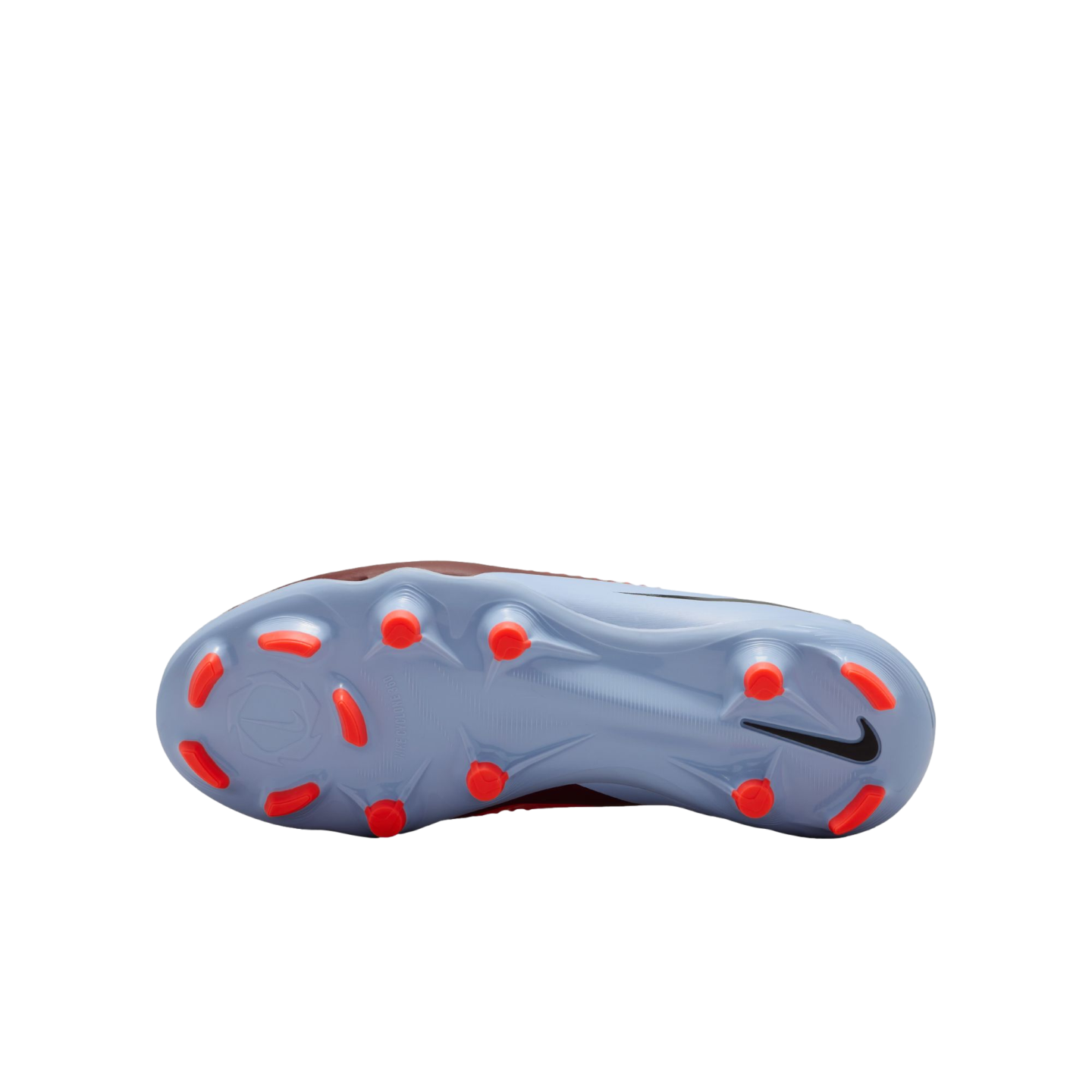 Underside view of a light blue Nike soccer cleat with bright orange studs and a black Nike swoosh, set against a solid black background.