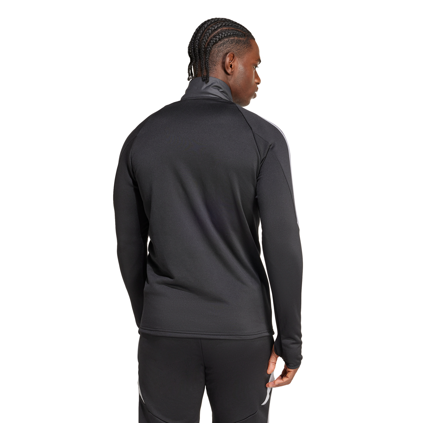 Rear view of a man with braided hair wearing a black athletic track jacket and matching pants against a white background.