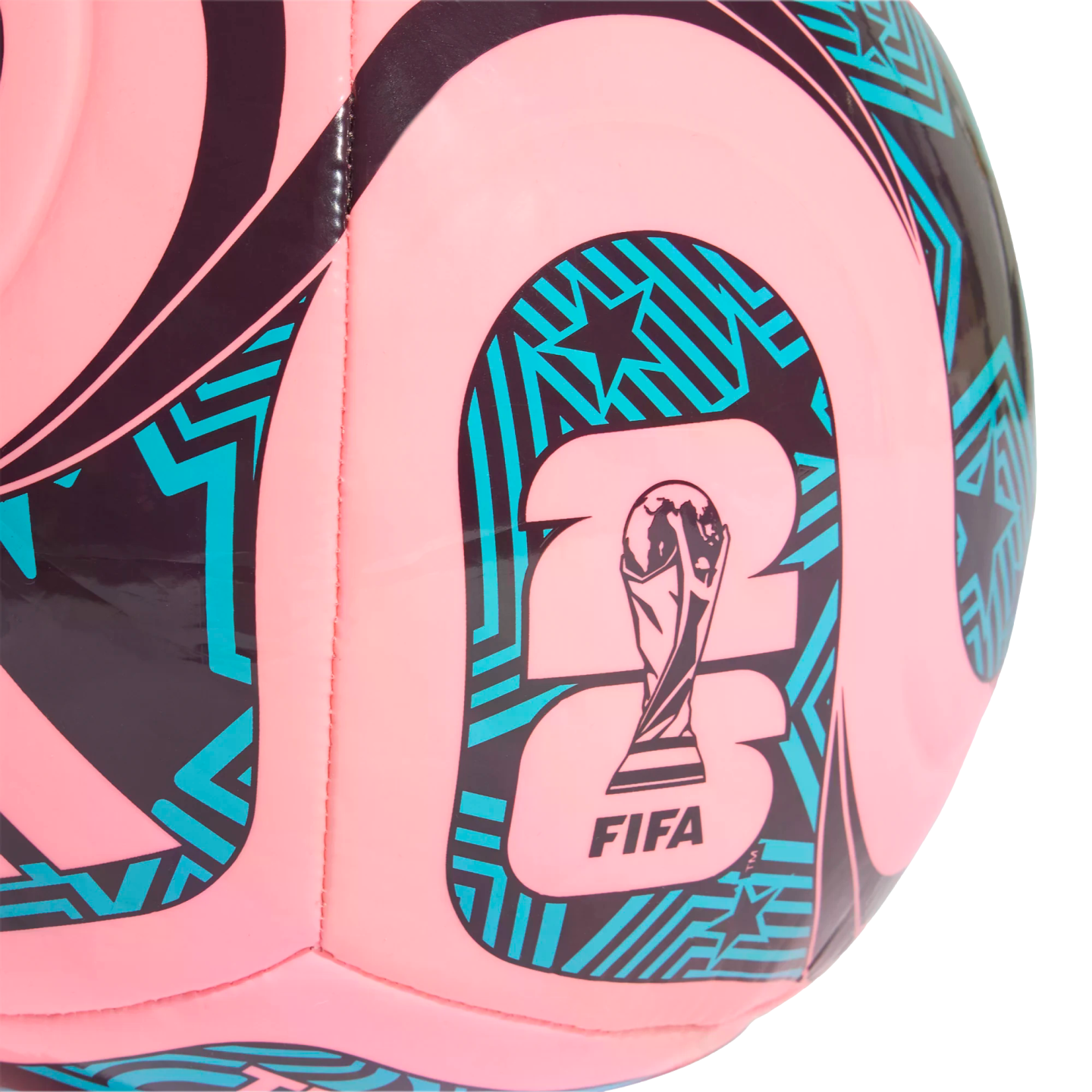 Close-up of a pink soccer ball with teal and black patterns. The center shows the official 2026 FIFA World Cup trophy logo.