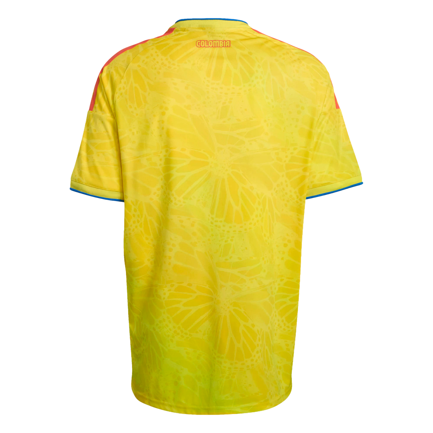 Back of a yellow Colombia soccer jersey with a subtle butterfly wing pattern, red shoulder stripes, and "COLOMBIA" in red text near the collar.