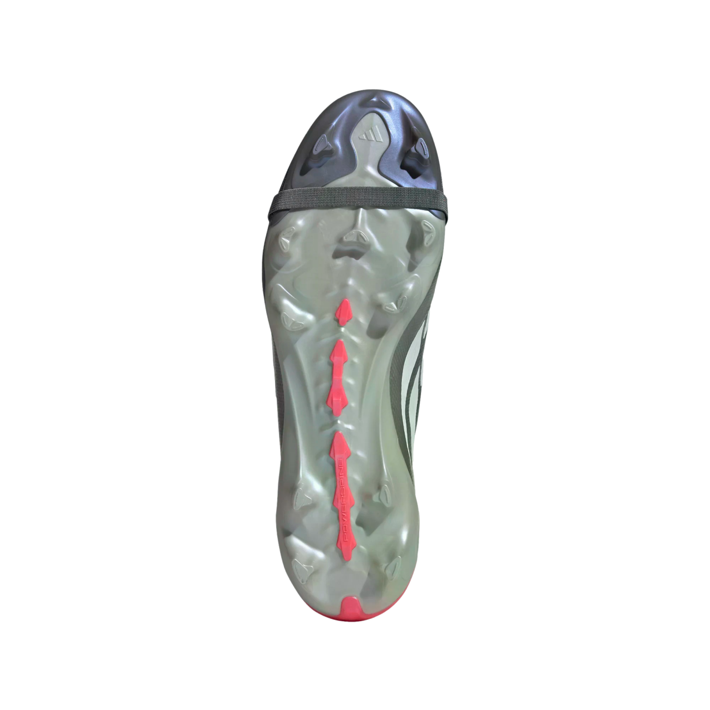 The underside of an Adidas soccer cleat with a translucent grey sole, red PowerSpine accents, and a black elastic strap across the front.