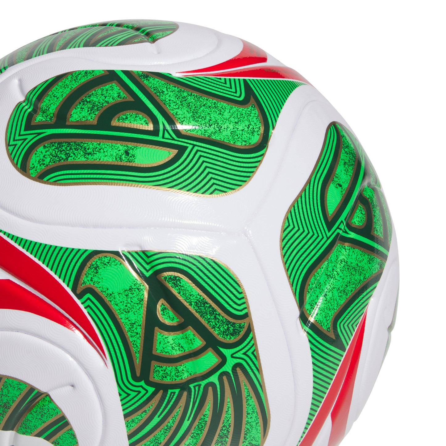 A close-up of a white soccer ball featuring intricate green and red patterns with gold outlines against a solid black background.