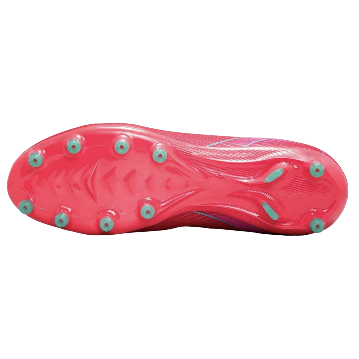 Bottom view of a pink soccer cleat showing the soleplate with light green studs and intricate molded patterns against a solid black background.