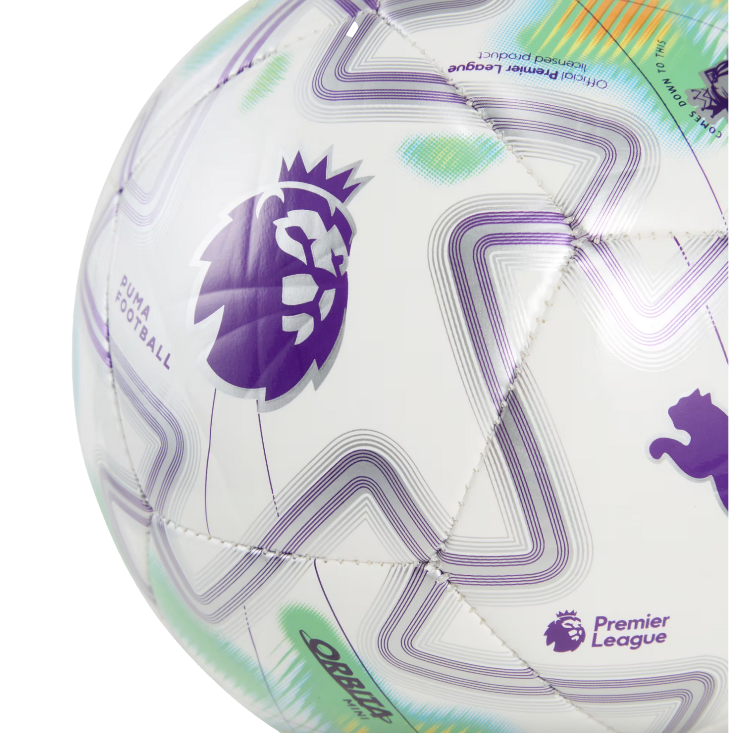 Close-up of a white Puma soccer ball featuring the purple English Premier League lion logo and geometric patterns in purple, silver, and green.