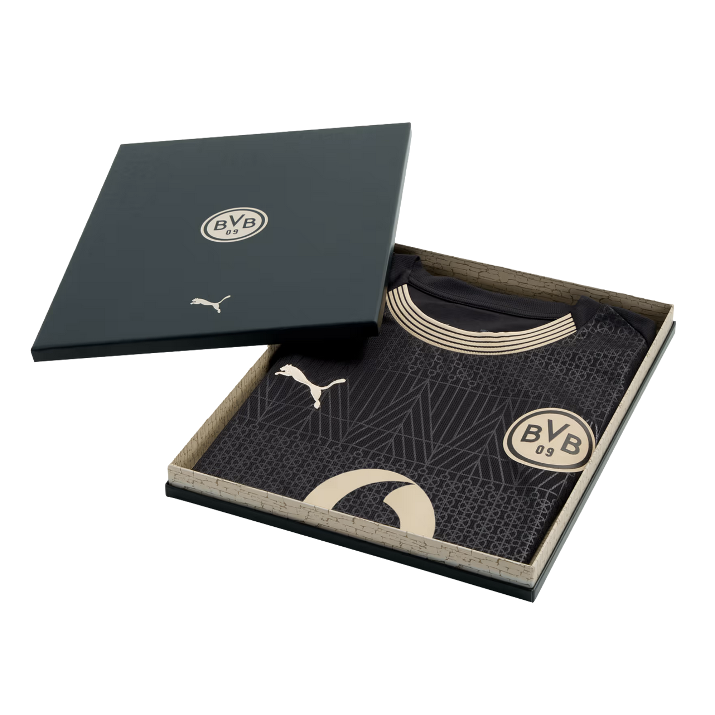 A black Borussia Dortmund soccer jersey with gold Puma and BVB logos, inside an open black presentation box.