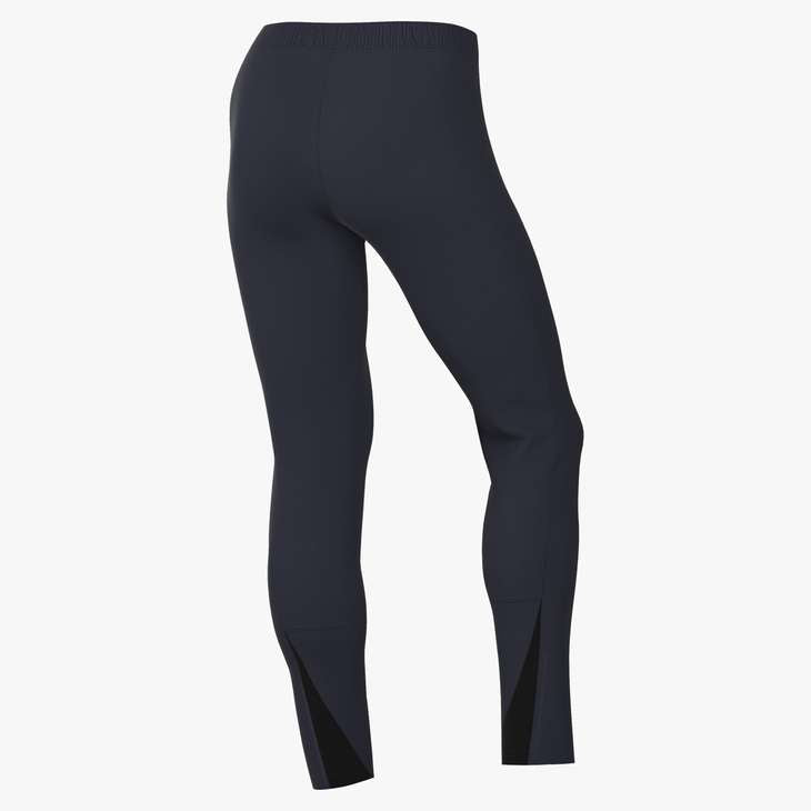 Rear view of dark navy blue athletic leggings with an elastic waistband and triangular black mesh panels at the back of the ankles.