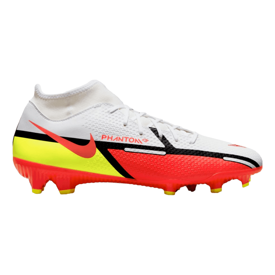 A Nike Phantom GT soccer cleat featuring a white upper, vibrant red lower section and Swoosh, yellow heel, and black diagonal accents.