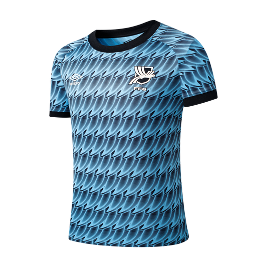Light blue Umbro soccer jersey with a dark blue wing-like pattern, a white stylized bird crest labeled "FFG," and black trim on the collar and sleeves.