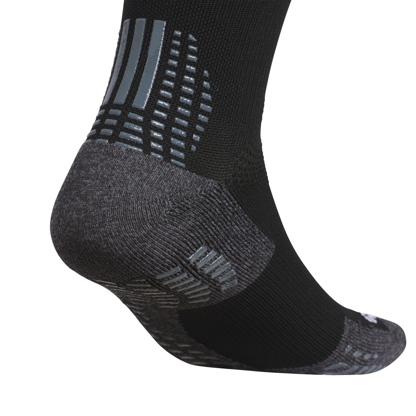 A close-up of a black athletic sock with a dark gray reinforced heel and shiny, light-gray non-slip grip patterns on the back and bottom for traction.