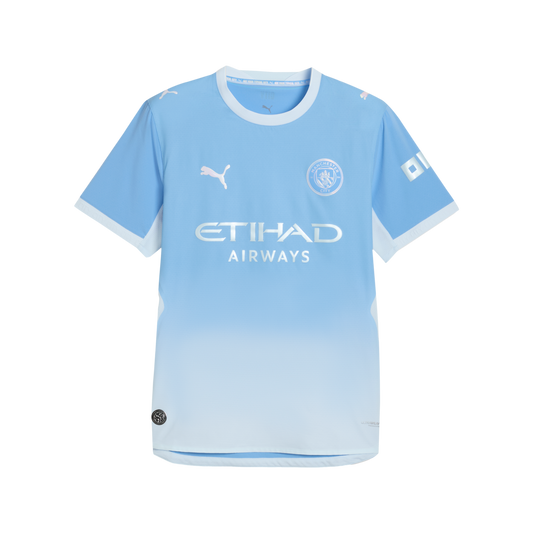 Manchester City light blue football jersey with a gradient fade to white. Features the club crest, Puma logo, and silver Etihad Airways sponsor text.