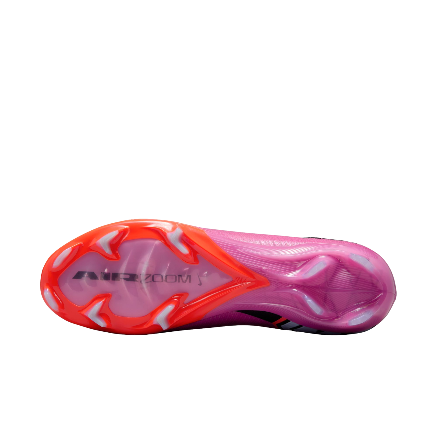Underside view of a pink and orange Nike soccer cleat with "AIR ZOOM" branding and translucent studs, set against a solid black background.