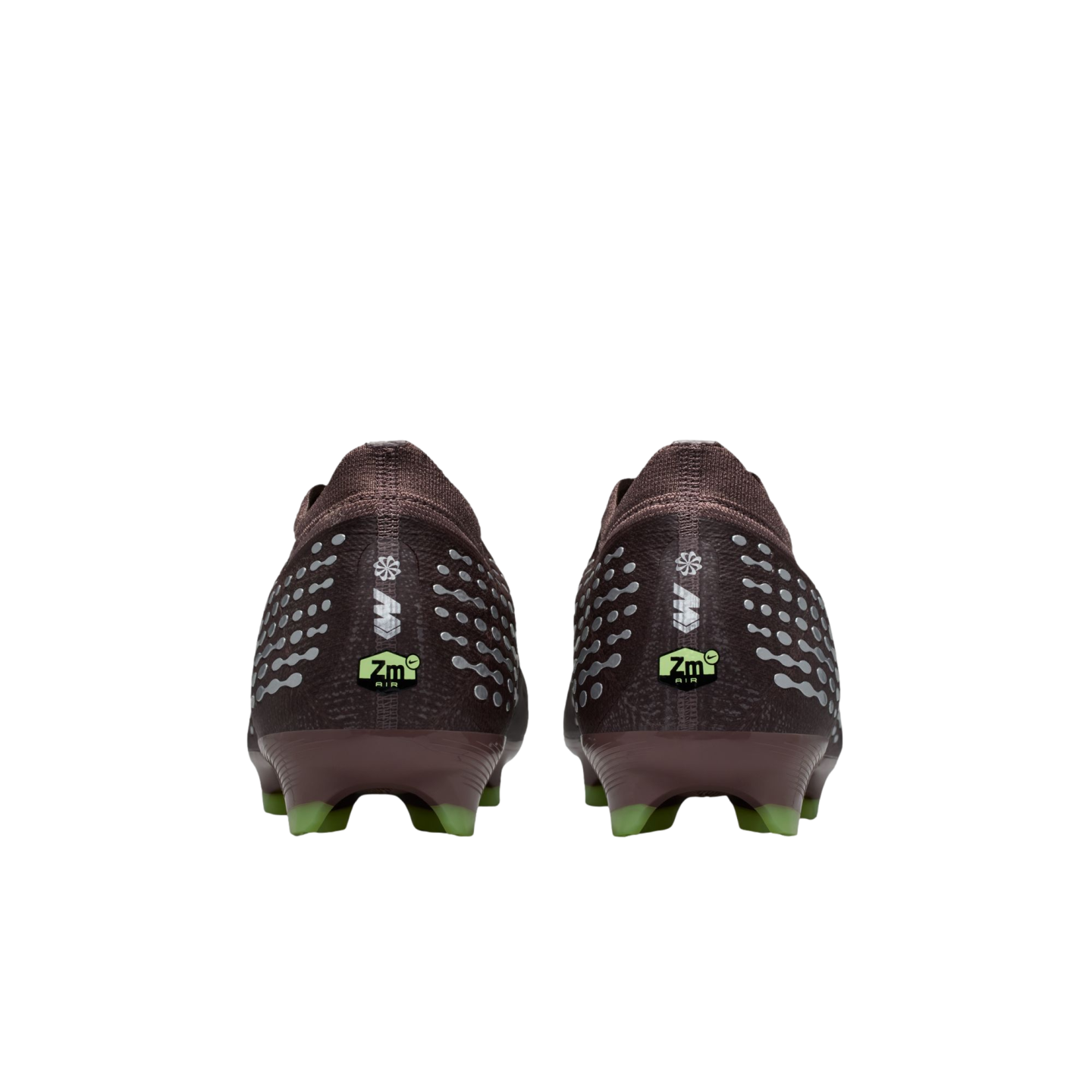 Rear view of two dark maroon soccer cleats with silver patterns, neon green "Zm AIR" branding on the heels, and green studs against a black background.