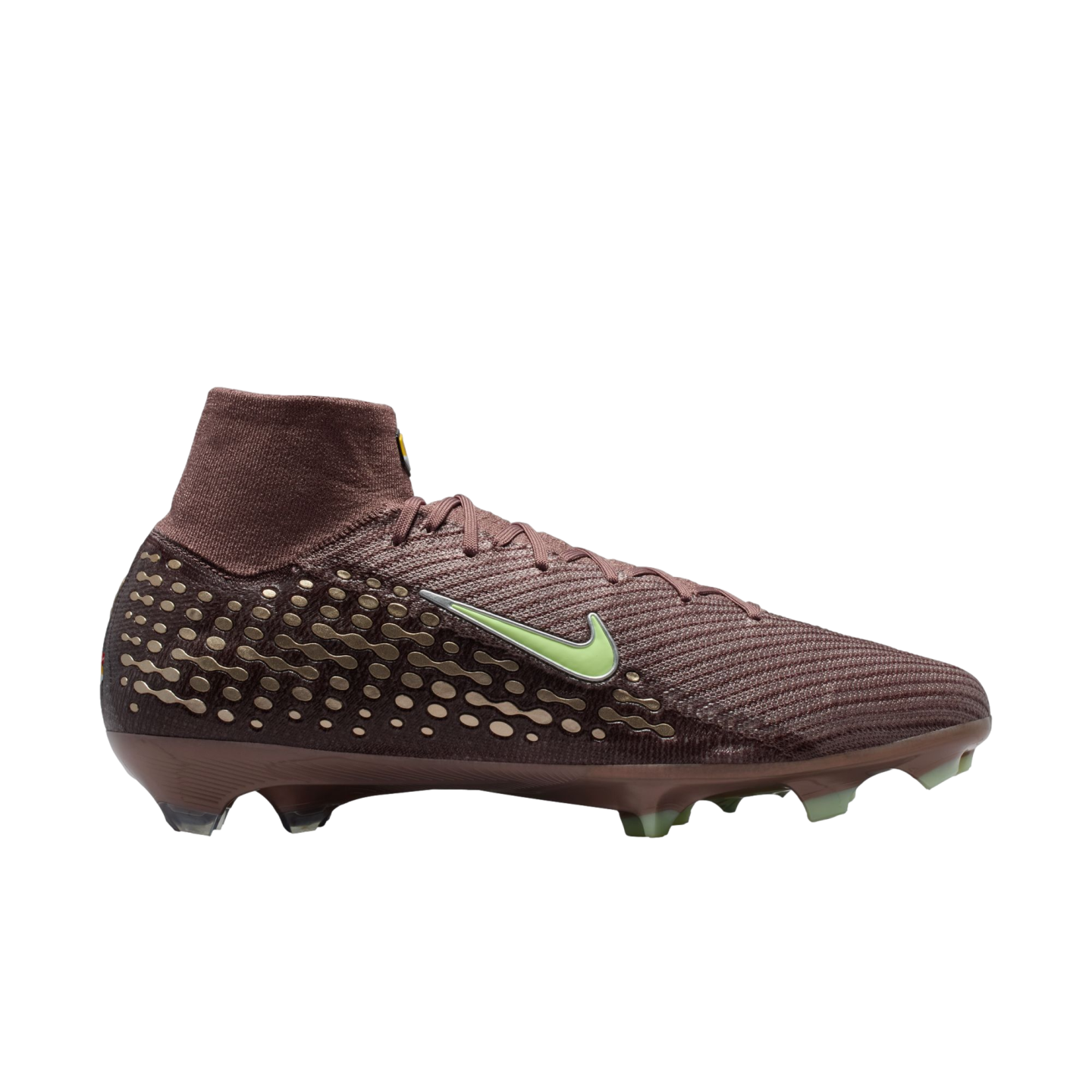 Side view of a maroon Nike high-top soccer cleat with a lime green Swoosh and golden textured heel patterns against a black background.