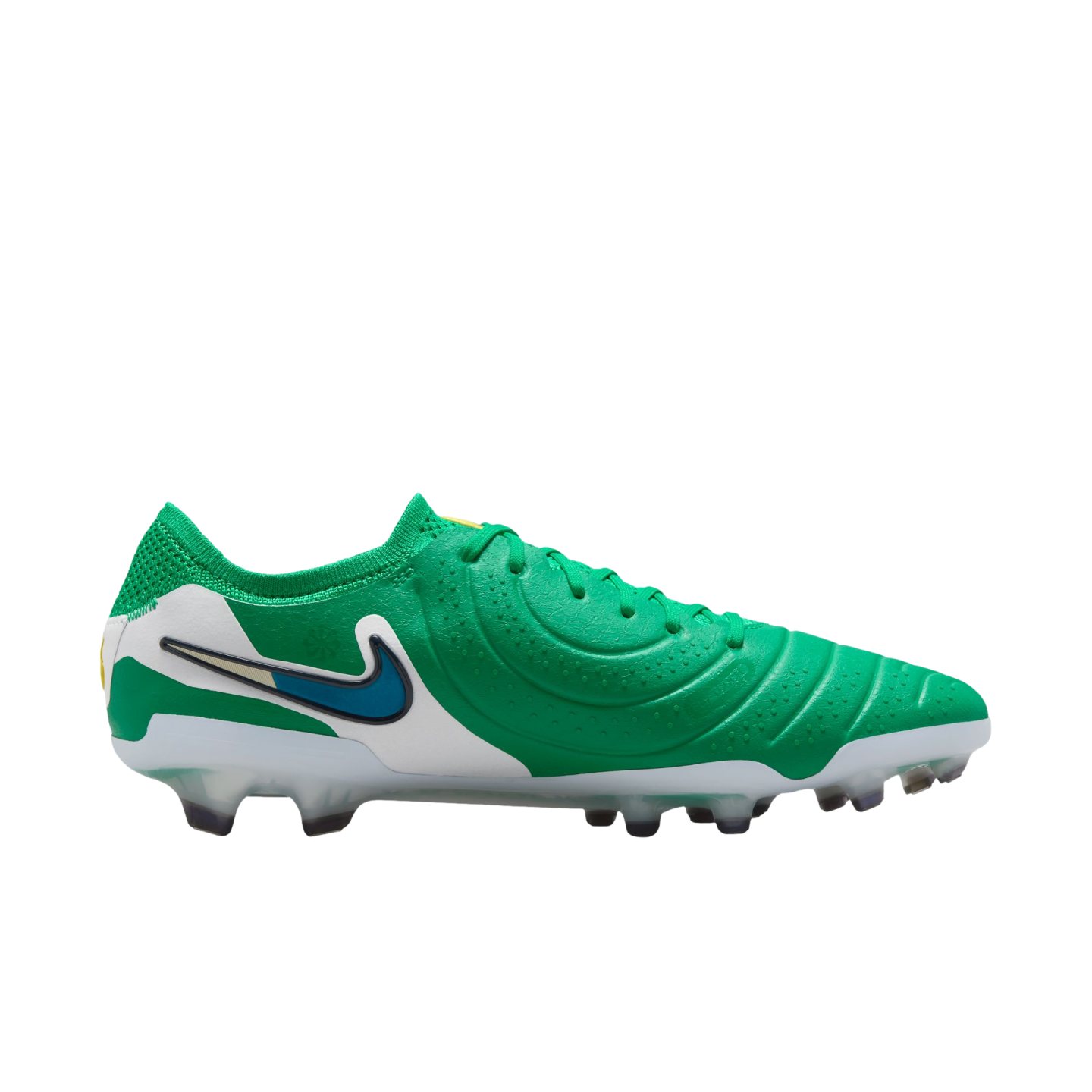 A green and white Nike Tiempo Legend 10 soccer cleat with a blue swoosh logo, shown from the side against a white background.