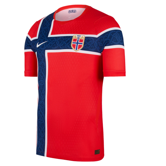 Red Nike Norway national soccer jersey featuring a large blue and white cross with a knotwork pattern, the team crest, and a white Nike swoosh.