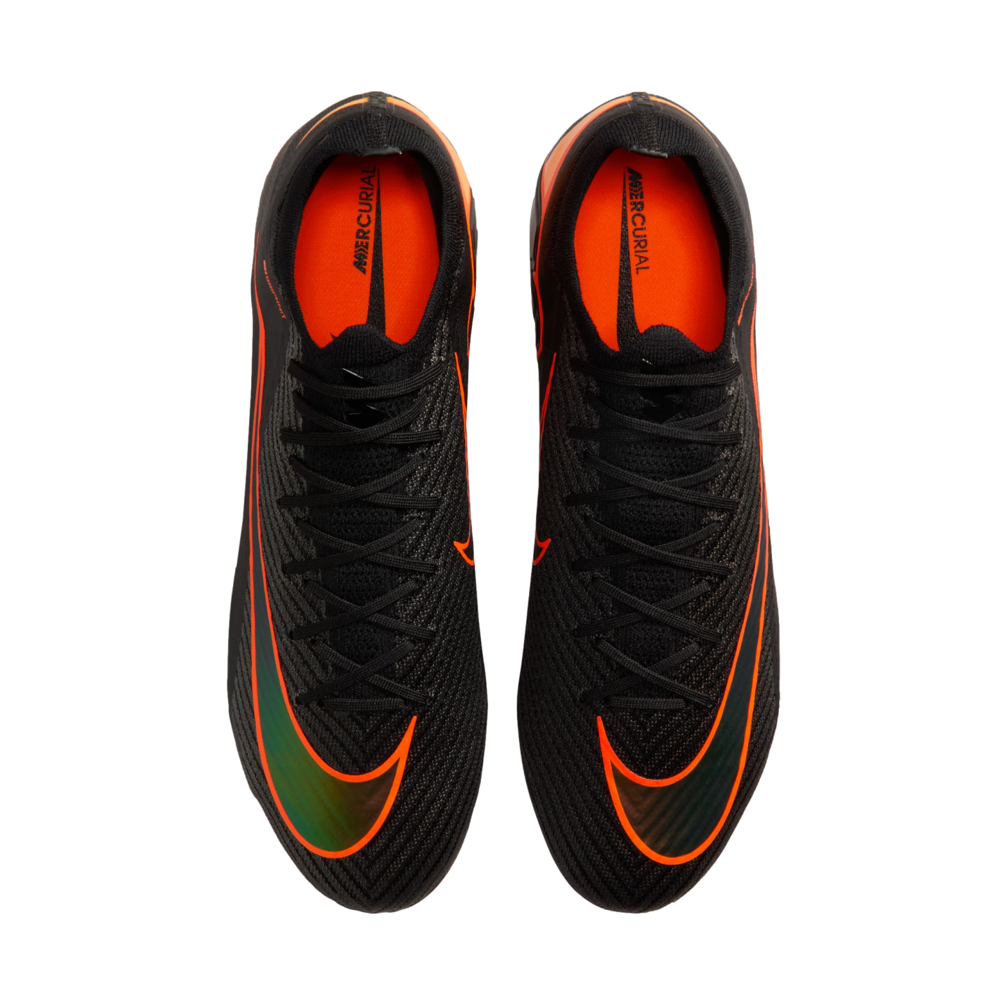 Top-down view of a pair of black Nike Mercurial soccer cleats with orange accents and iridescent Nike swooshes.
