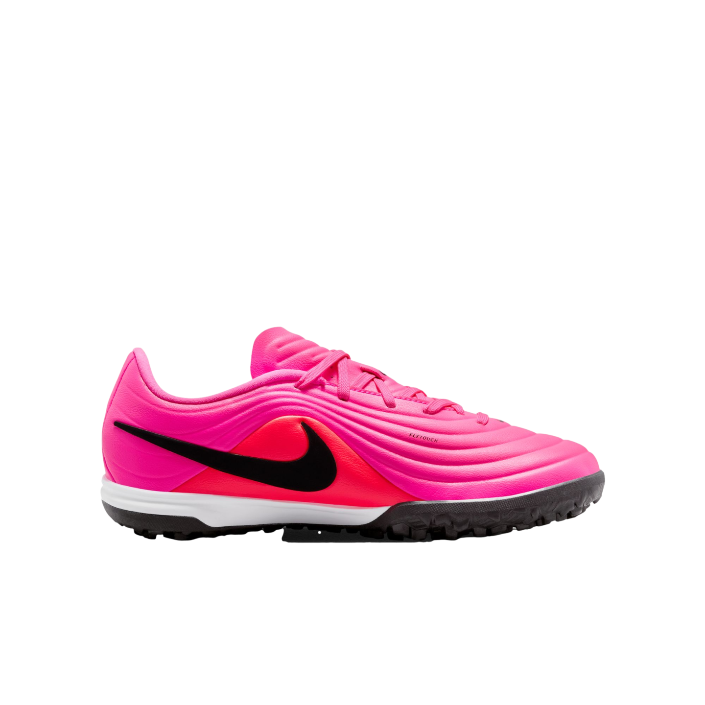 A vibrant pink and neon red Nike soccer shoe for artificial turf with a black Nike swoosh on the side and a black rubber outsole on a plain white background.