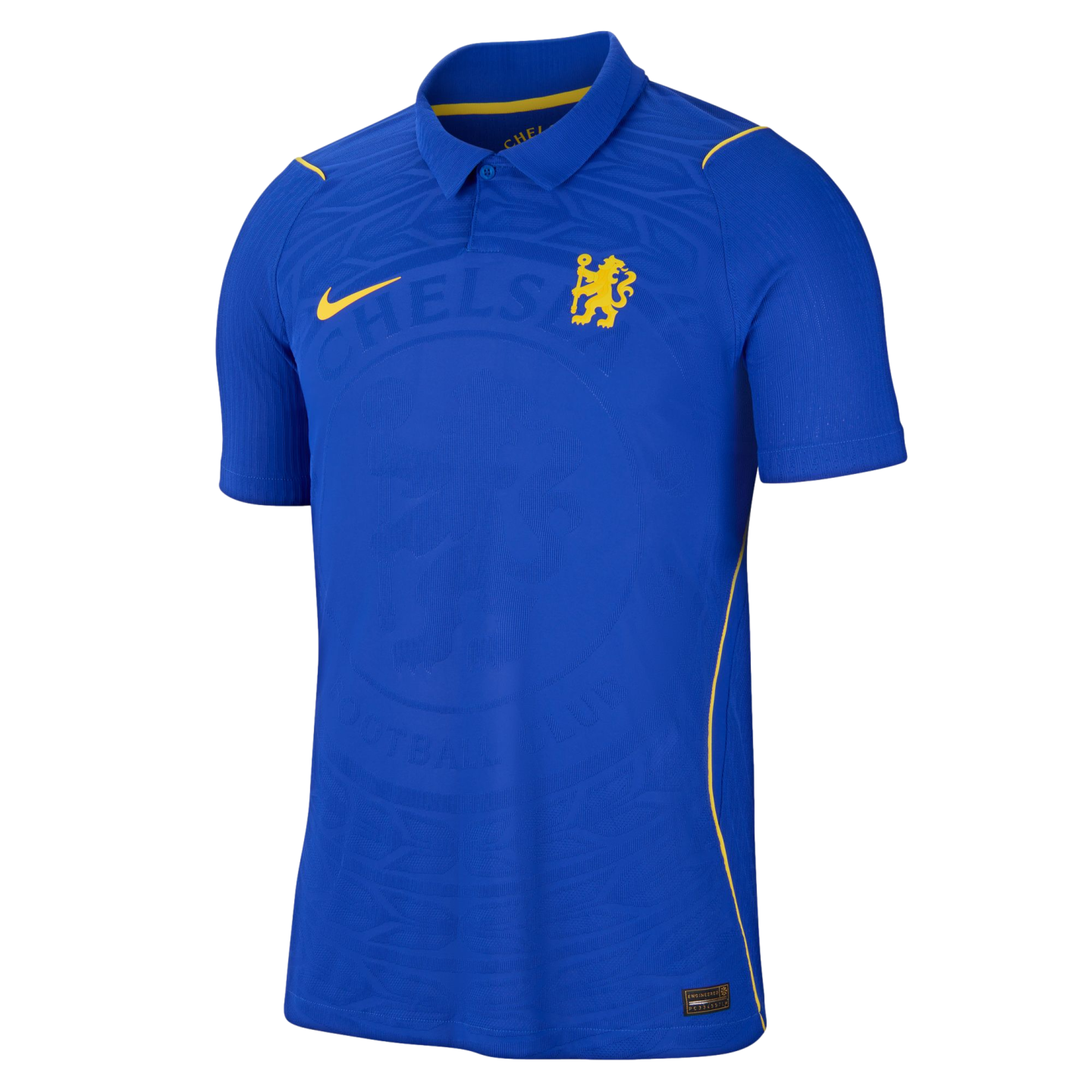 A blue Chelsea FC soccer jersey by Nike. Features a yellow swoosh and lion crest, a polo collar, and a tonal embossed pattern on the blue fabric.