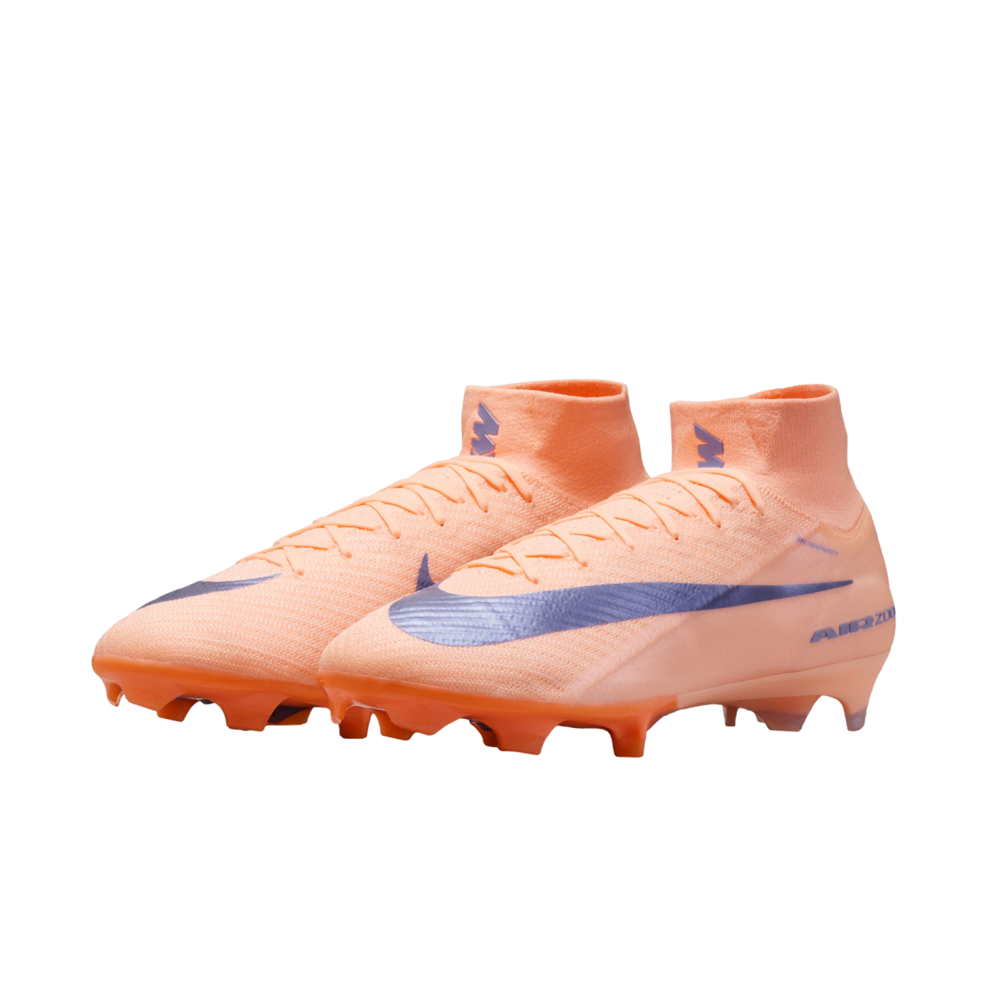 Peach-colored high-top Nike soccer cleats with a purple swoosh and orange studs, set against a black background.