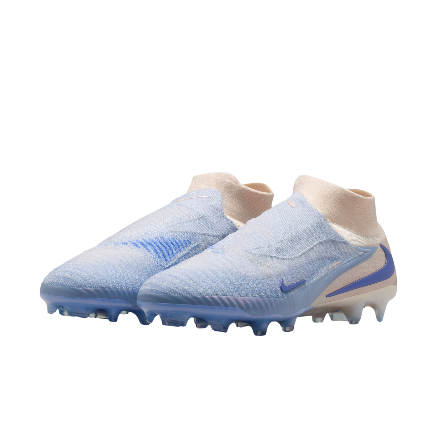 A pair of light blue and pale pink Nike soccer cleats with purple accents, shown at an angle against a black background.