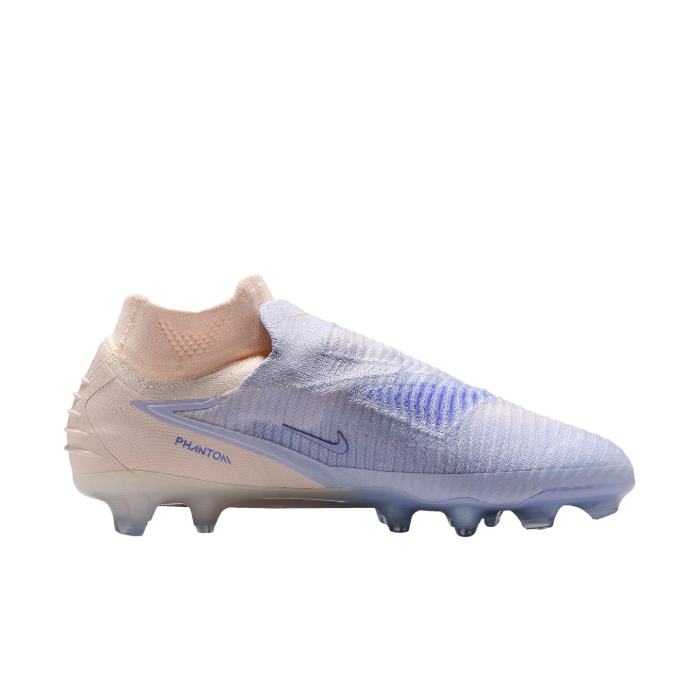 Nike Phantom soccer cleat in pale pink and light blue on a black background. It features a laceless design, high-top sock collar, and firm ground studs.