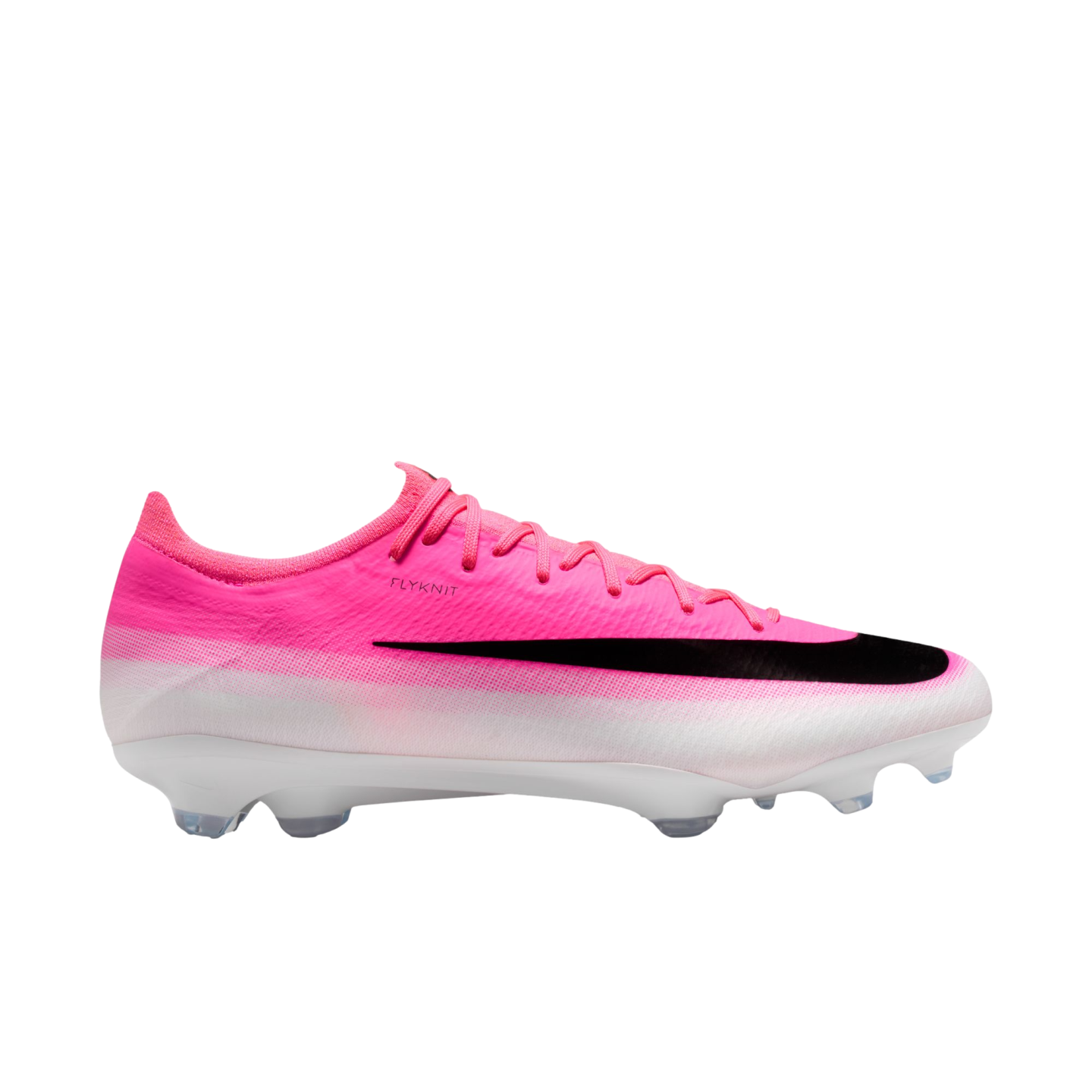 Side view of a pink and white Nike Flyknit soccer cleat featuring a large black swoosh and clear studs.