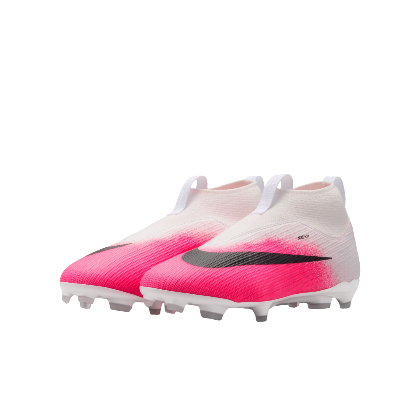 A pair of laceless Nike soccer cleats featuring a white-to-vibrant-pink gradient upper, black swooshes, and white studs on a plain background.
