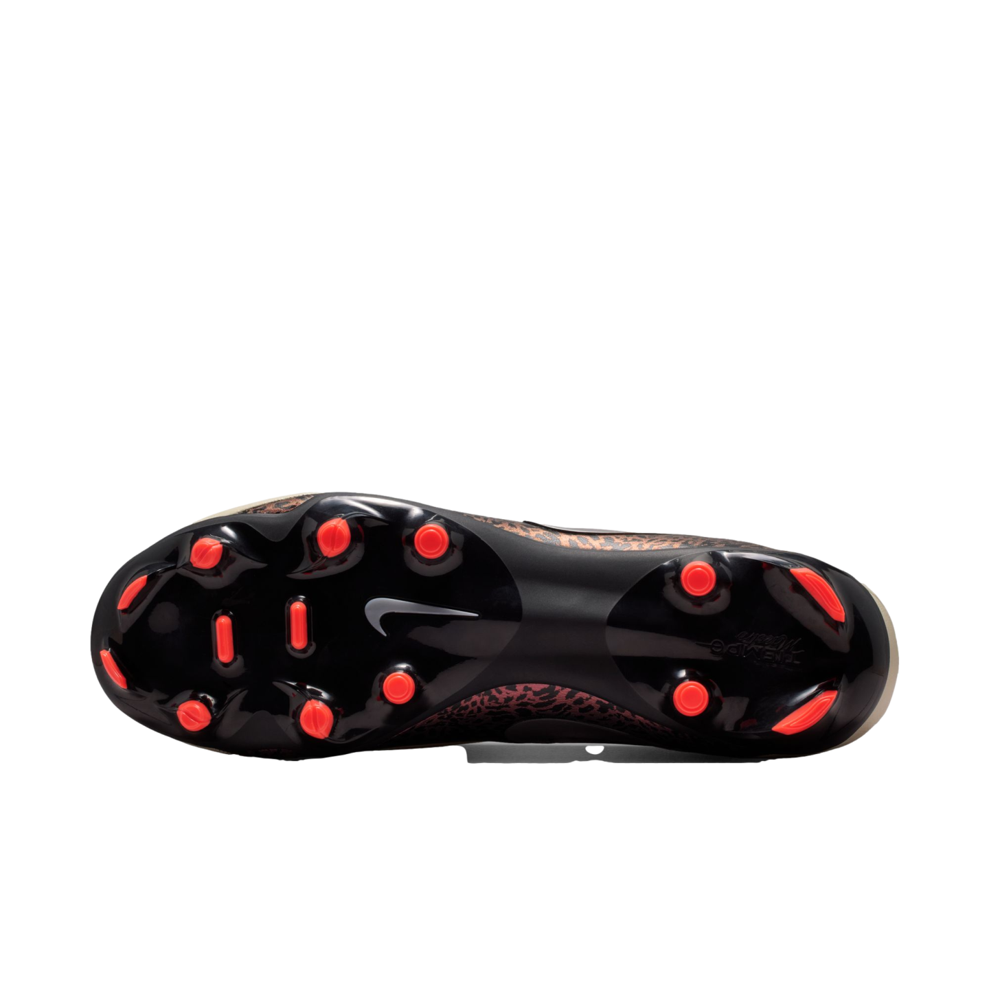 Underside view of a Nike soccer cleat with a black soleplate, bright orange studs, and a white swoosh logo. A brown leopard print pattern is visible along the edges of the upper.