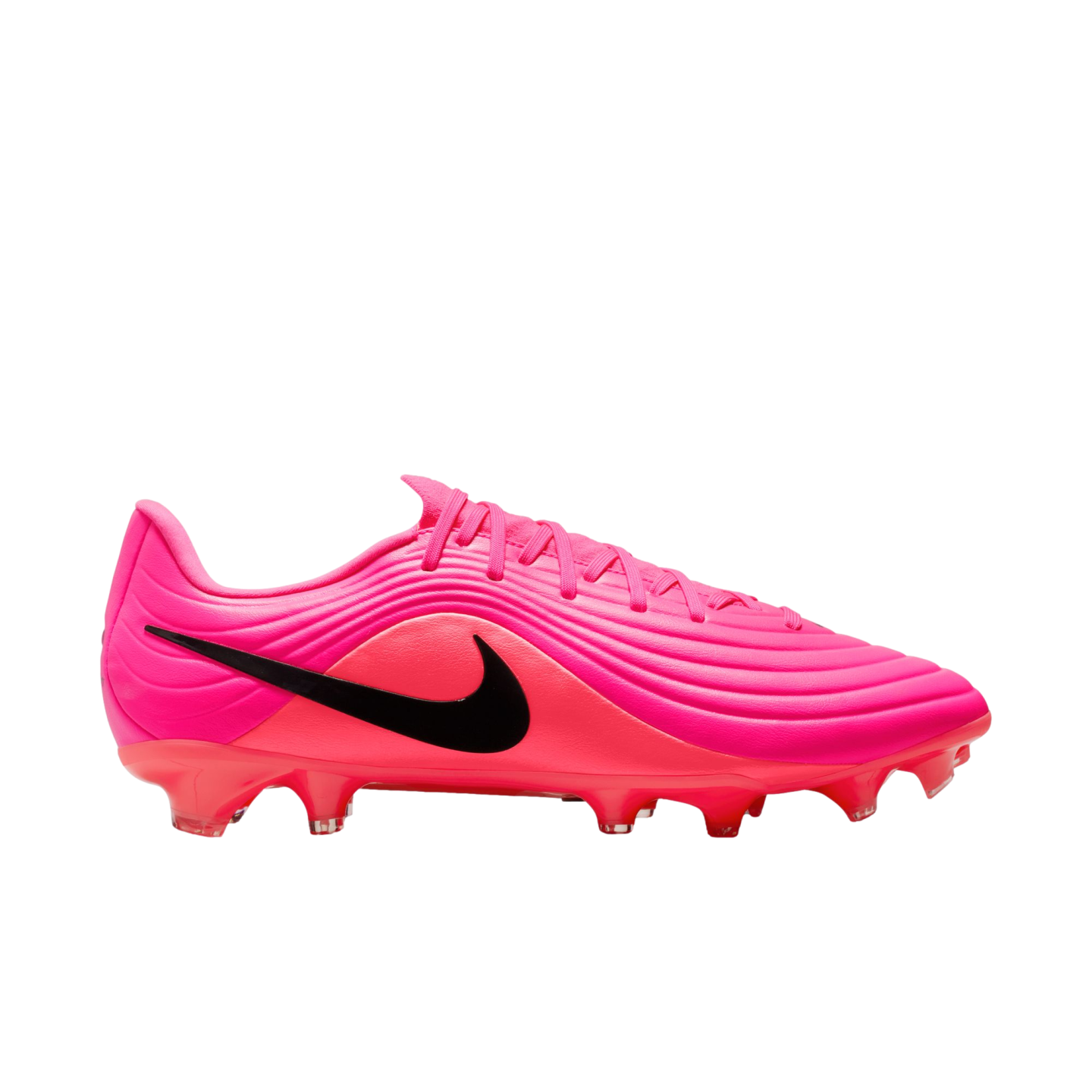 A side profile of a bright pink and red Nike soccer cleat with a black swoosh and textured upper against a white background.