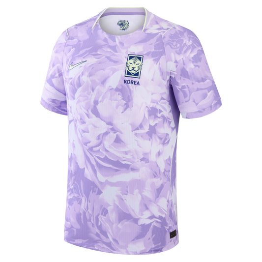 Light purple Nike South Korea soccer jersey with an all-over tonal floral pattern, featuring the national team crest and a white Nike swoosh on the chest.