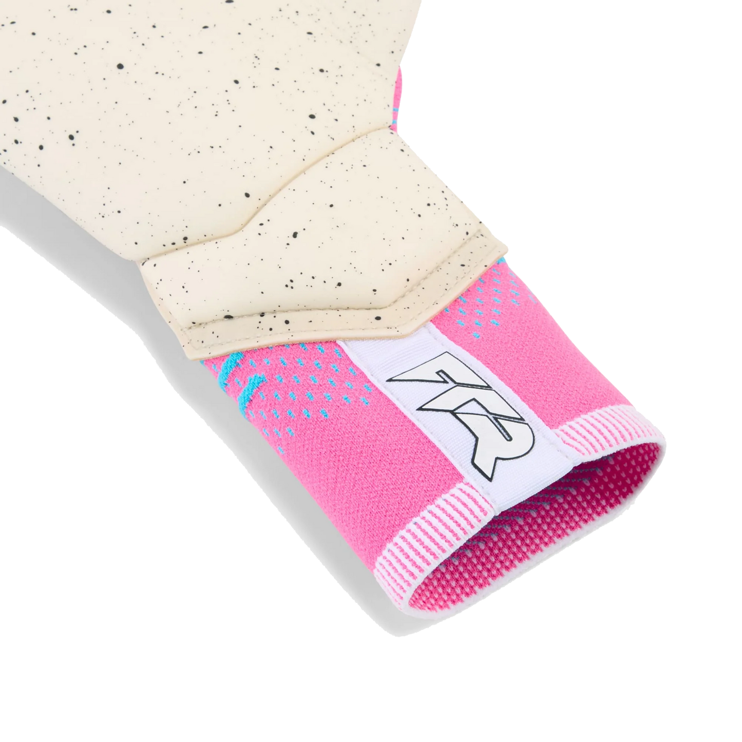 Close-up of a goalie glove showing a pink knit strapless cuff with a white "TR" logo and a cream-colored, black-speckled latex palm.