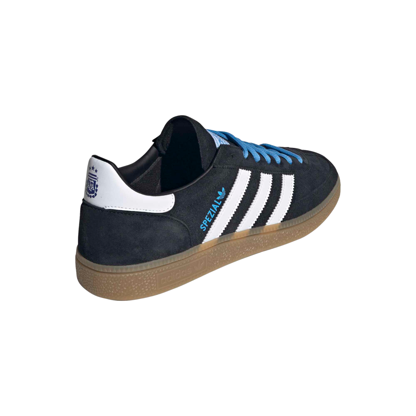 Adidas Handball Spezial sneaker in black suede with white stripes, blue laces, and gum sole, shown from a rear three-quarter angle on a solid black background.