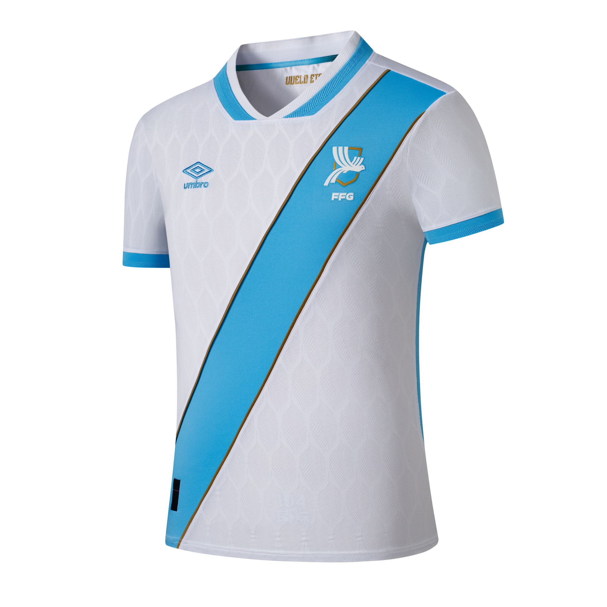 White Umbro soccer jersey with a diagonal light blue sash, gold trim, and bird crest. The white fabric features a subtle, embossed leaf-like pattern.