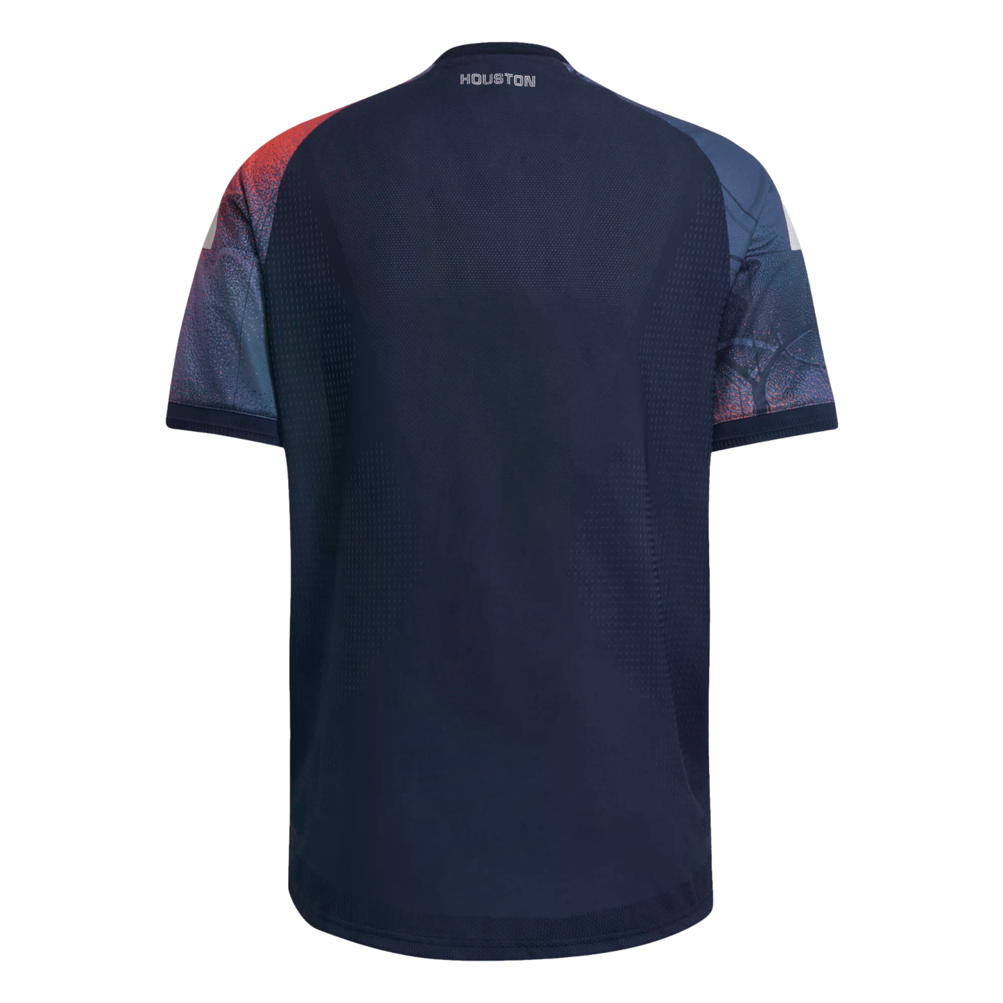 Back view of a navy blue soccer jersey with red and teal patterned sleeves and the word "HOUSTON" printed on the back neck.