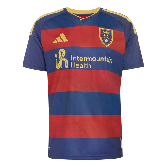 A Real Salt Lake soccer jersey with red and navy blue horizontal stripes, featuring a gold Adidas logo and gold Intermountain Health sponsor logo.