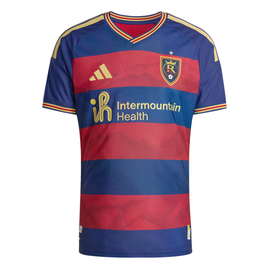 A Real Salt Lake soccer jersey with blue and red horizontal stripes, gold Adidas logo, team crest, and Intermountain Health sponsor logo.