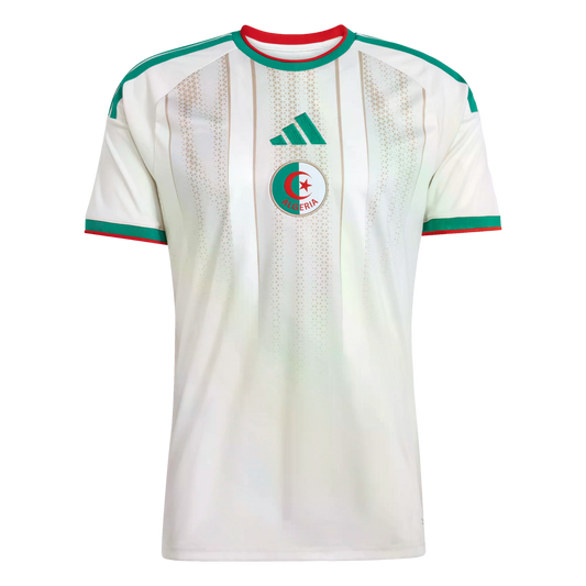 White Algeria national soccer jersey with centered team crest and green Adidas logo. Features green and red trim on the collar and sleeve cuffs.