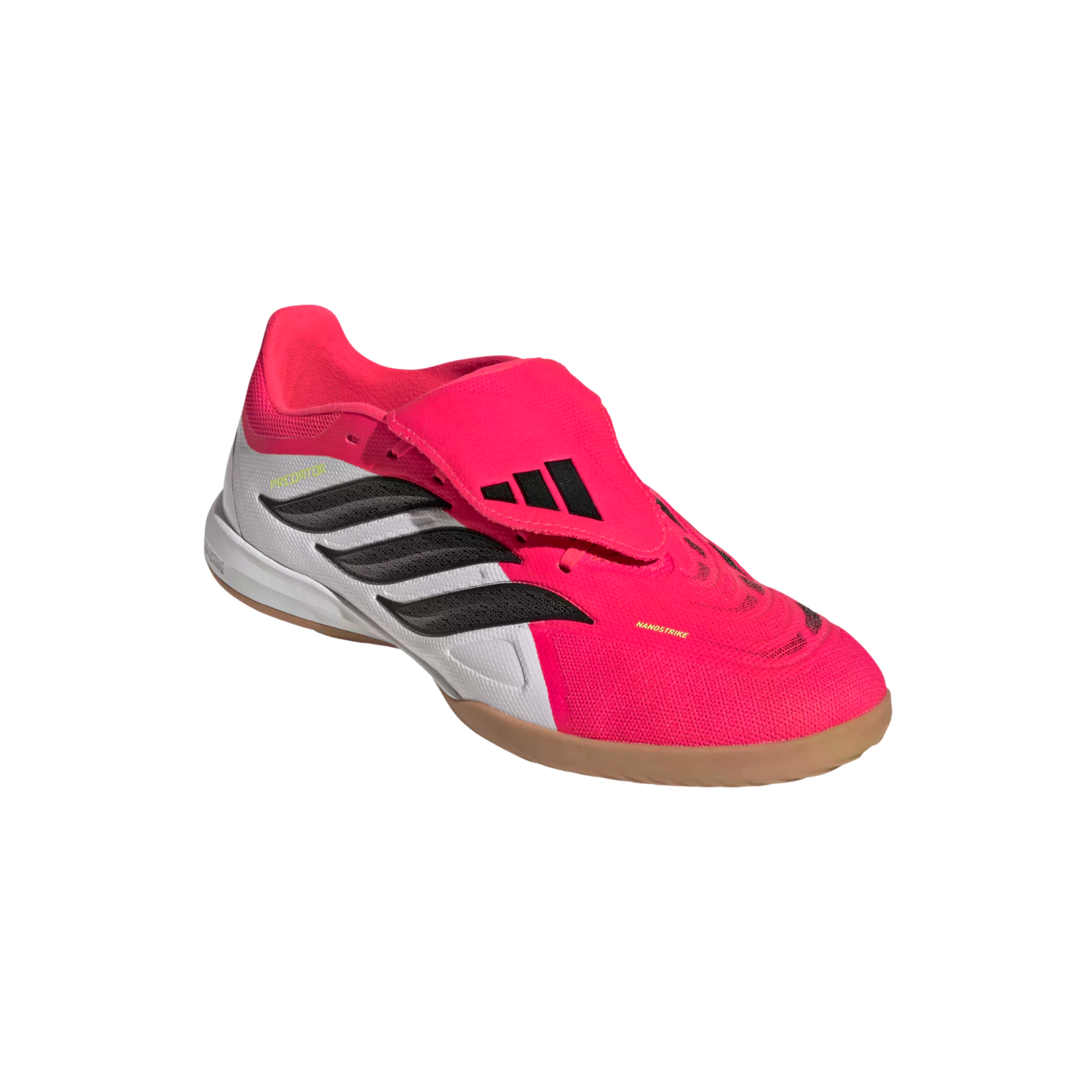 A bright pink and white Adidas Predator indoor soccer shoe with black stripes, a fold-over tongue, and a gum rubber sole.