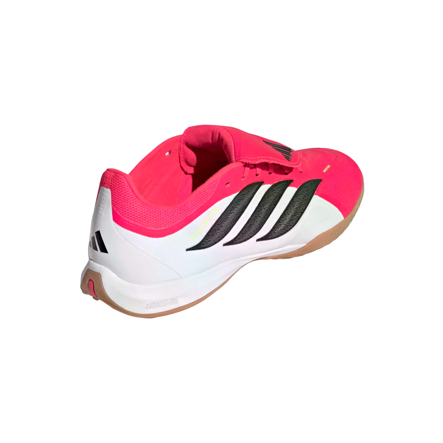 A side-rear view of an Adidas Predator indoor soccer shoe in pink, white, and black with a gum rubber sole and "Lightstrike" cushioning.