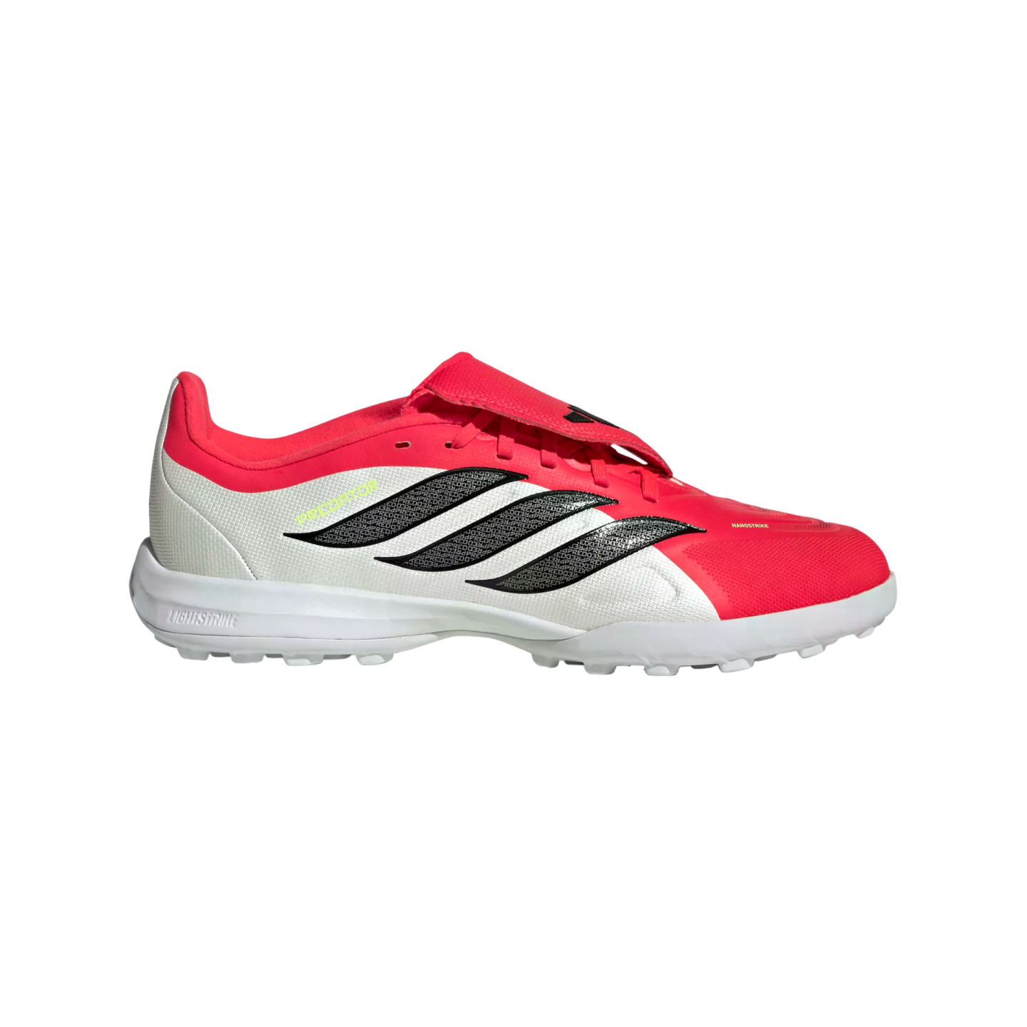 Side view of a white and pink Adidas Predator turf soccer shoe with three black stripes on a black background.