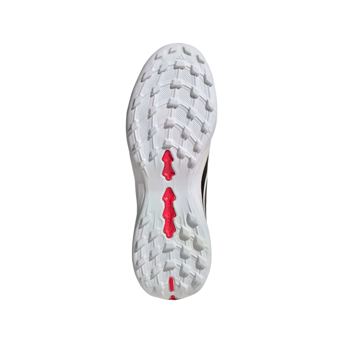 Textured white outsole of an athletic shoe with prominent red accents in the center and heel, shown against a plain black background.