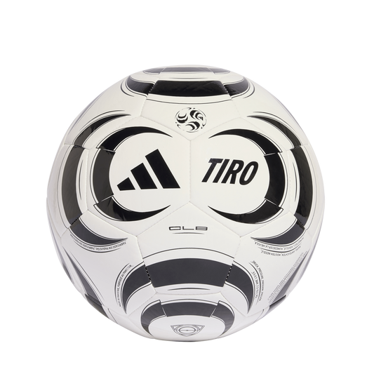 A studio shot of a white Adidas Tiro soccer ball featuring bold black graphic designs, centered against a solid black background. The ball displays the Adidas three-stripe logo and the word "TIRO" in black on its front panels.