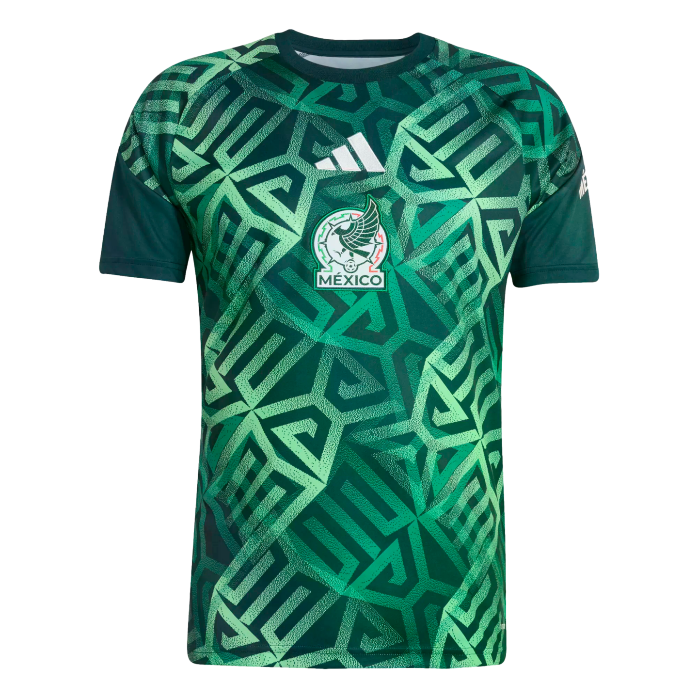 A front-facing green short-sleeved Mexico national team soccer jersey with an intricate geometric pattern. A centered Mexico national team crest and white Adidas logo are displayed on the chest.