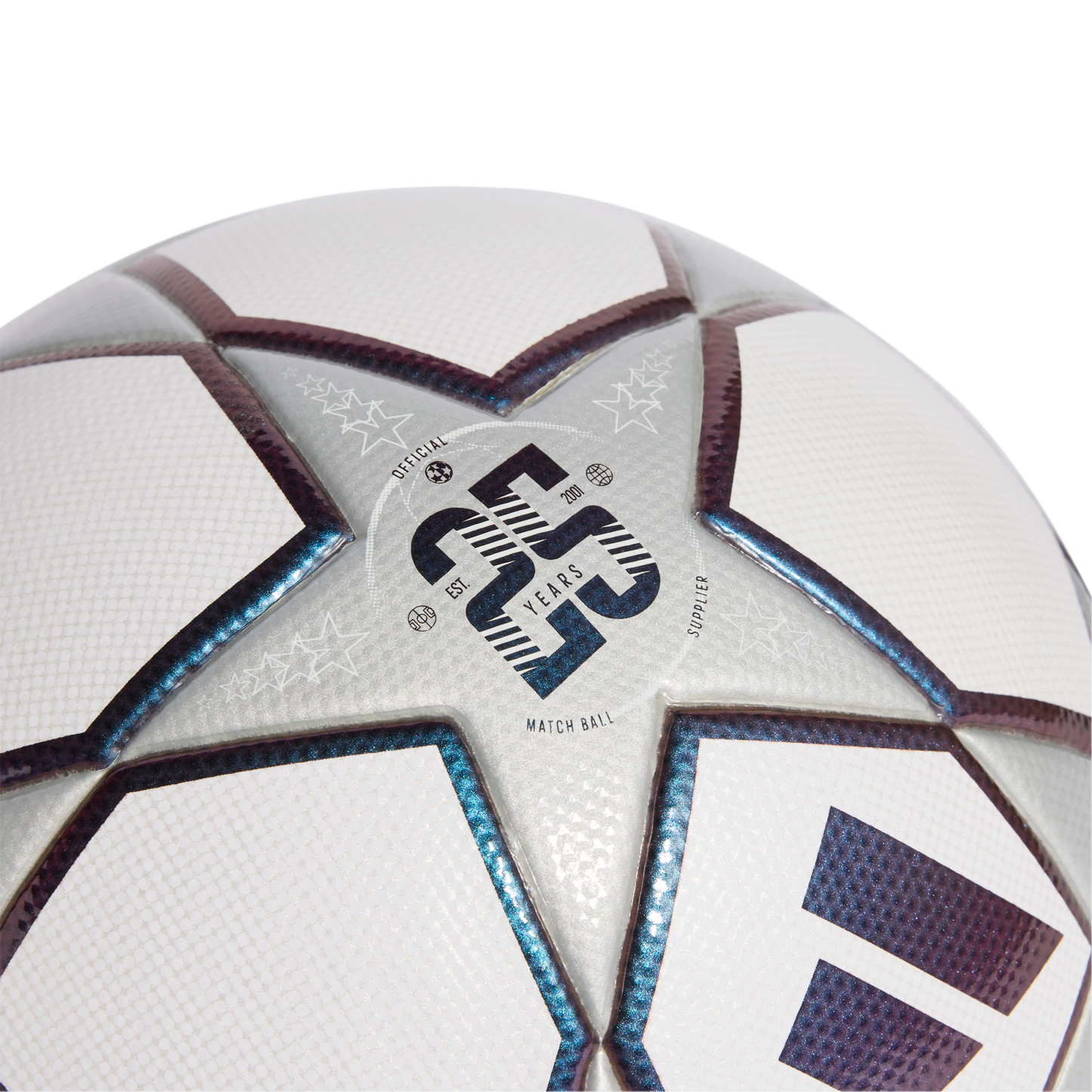 Close-up of a white and silver soccer ball with iridescent star panels. A central logo celebrates 23 years as the official match ball supplier since 2001.