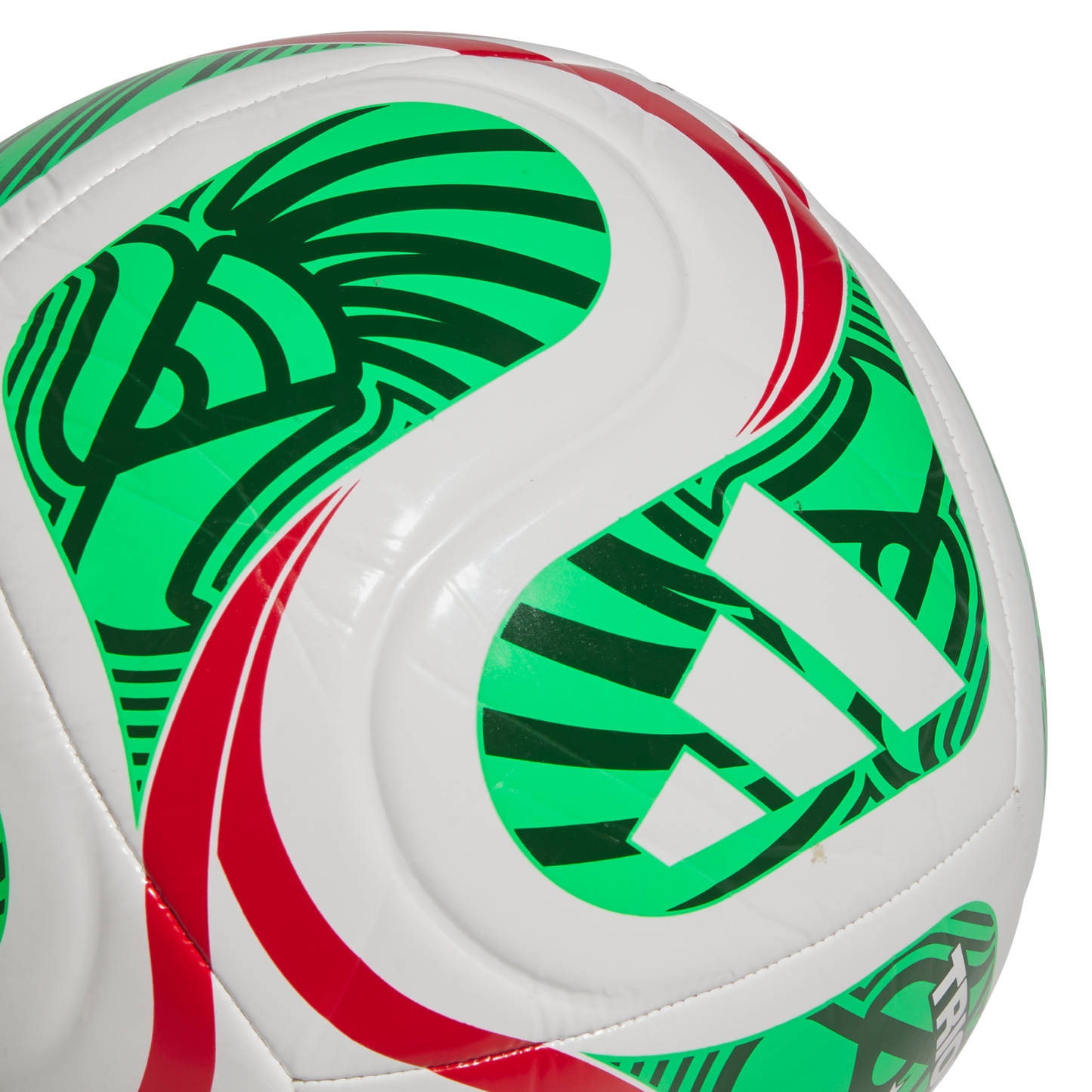 Close-up of a white Adidas soccer ball featuring vibrant green and red graphic patterns, set against a solid black background.