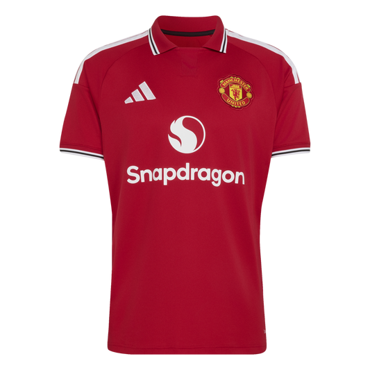 Red 2024/25 Manchester United home jersey featuring white Adidas stripes, the club crest, and a white Snapdragon sponsor logo centered on the front.